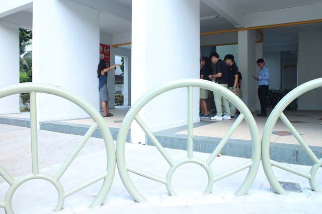 Housing blocks are surrounded by fancy boundary trimmings, but also serve as barriers to keep foreign workers out from Singaporean residents' spaces